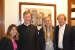 Romina and Fr. Mark stand with Eric Waldman & his daughter, Alexandra