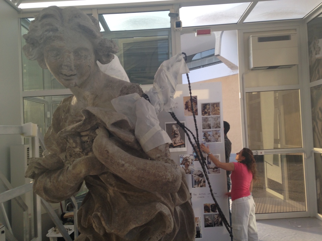 Kneeling Angel in the glass laboratory workplace before it was transferred to the Pinacoteca Gallery